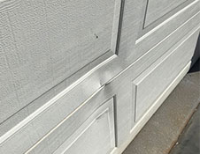 garage door repair dented panel
